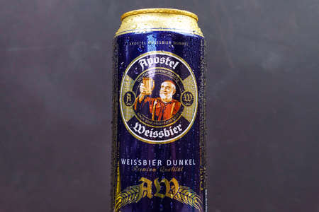 Tyumen, Russia-December 23, 2020: Apostel Weissbier Dunkel. German beer logo on aluminum can