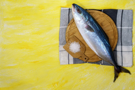 large seriola amberjack is a dumerili on a yellow background. top viewの写真素材