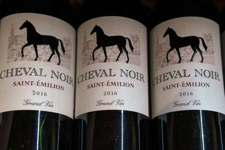 Tyumen, Russia-January 31, 2021: Cheval Noir wine is made from Merlot and Cabernet Franc grapes
