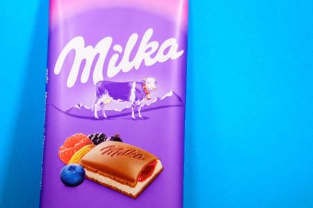 Tyumen, Russia-april 17, 2021: Milka chocolate with almonds and berries, made by Mondelez Intl....