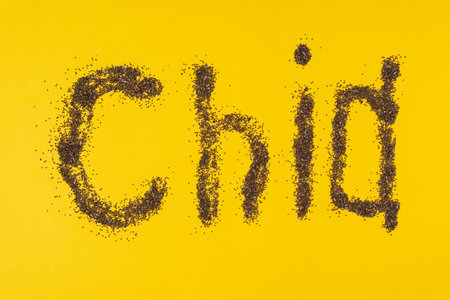 Chia cryptocurrency concept. The word chia on a yellow background. top viewの写真素材