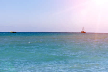 Sea view, sailboats far away in the sea in sunny day, natural background.