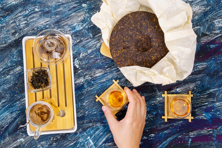 Tea ceremony with Chinese puer tea, top view. Dark backgroundの写真素材