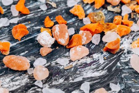 Dried carrot spice close-up falls. Cooking and Healthcare concept. Selective focus.