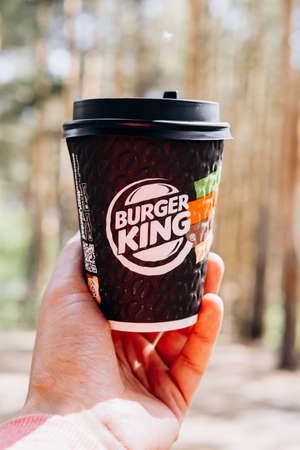 Tyumen, Russia-May 25, 2021: Burger Kings coffee cup. American Fast Food Restaurant.のeditorial素材