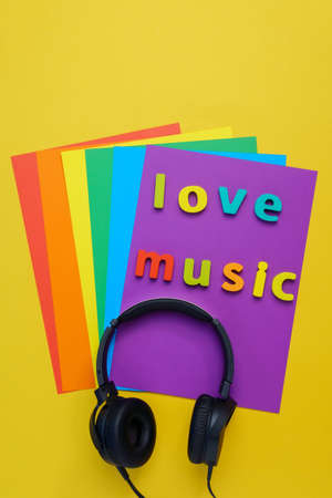 Love for music headphones on a colored background. Top viewの写真素材