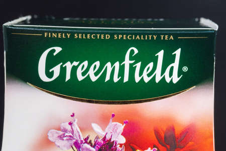 Tyumen, Russia-May 25, 2021: black leaf tea Greenfield in a pack logo. Popular tea in Russiaのeditorial素材