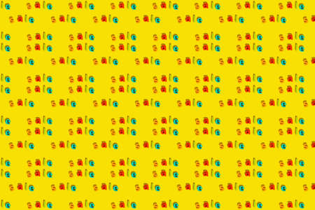 Pattern made with inscription Sale on a yellow background. Creative art concept.の写真素材