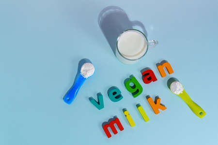 Alternative types of vegan dry milks Multi-colored background. Space for copying textの写真素材