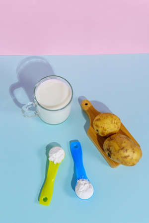 Dry potato milk is a good option for people who do not tolerate soy or gluten. Vertical photoの写真素材