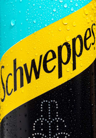 Tyumen, Russia-May 25, 2021: Aluminum can of the Schweppes Close-up logo. Vertical photoのeditorial素材