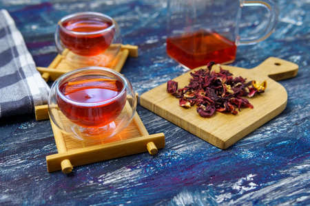 Red hibiscus herbal tea red hibiscus flower and dried herbal tea.の写真素材