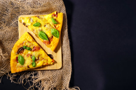 Homemade rustic style pizza with grated Parmesan cheese sauce and basil. Flat lay, top view.の写真素材