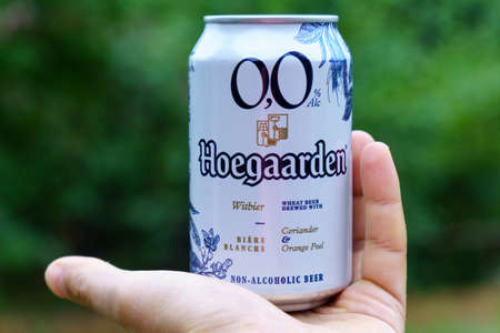 Volzhsky, Russia-September 25, 2021: Hoegaarden beer non alcoholic. Selective focusのeditorial素材