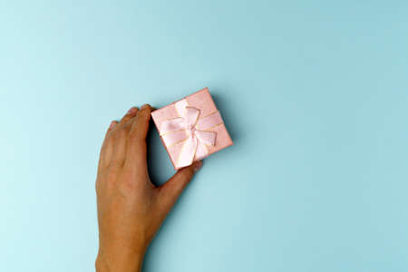 Gift box present gift, holiday, xmas, christmas 2022. shopping, sale banner, coupon concept. Blue background top viewの写真素材