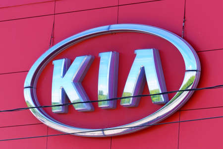 Tyumen, Russia-June 4, 2021: KIA MOTORS car selling and service center. KIA logo close upのeditorial素材