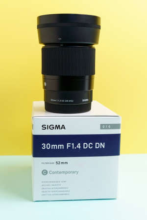 Tyumen, Russia-October 14, 2021: Sigma 30mm F1.4 Contemporary DC DN Lens for Sony E