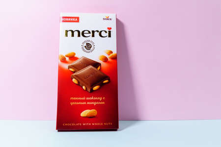 Tyumen, Russia-October 15, 2021: Merci is a brand dark chocolate with almonds candy produced by the...