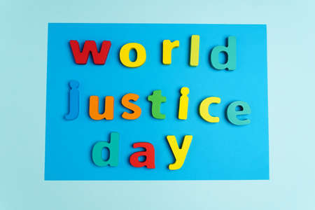 Text World Justice Day is celebrated on February 20. Top view.