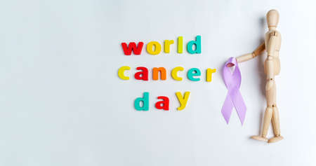 World Cancer Day is February 4th to support people living and diseases. White background copy spaceの写真素材