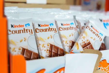 Tyumen, Russia-December 02, 2021: Kinder brand chocolate snacks for sale on shelves. Gift sets for New Year and Christmasのeditorial素材