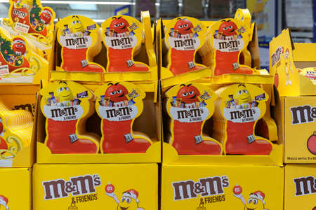 Tyumen, Russia-December 02, 2021: Milk chocolate m and ms made by Mars Inc. Selective focusのeditorial素材