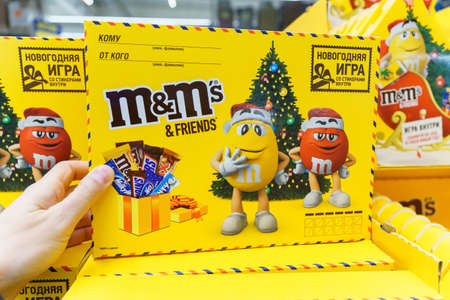 Tyumen, Russia-December 02, 2021: Chocolate m and ms Crispy Chocolate. Friends