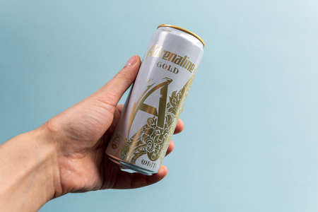 Tyumen, Russia-December 27, 2021: Aluminium can of the Adrenaline Rush energy drink, adrenaline goldのeditorial素材