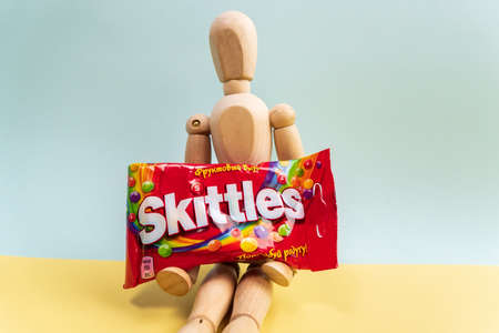 Tyumen, Russia-December 27, 2021: Original Skittles brand candies. Multicolored background. delicious sweet skittlesのeditorial素材
