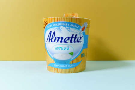 Tyumen, Russia-October 15, 2021: Almette cream cheese. Light cheese copy spaceのeditorial素材