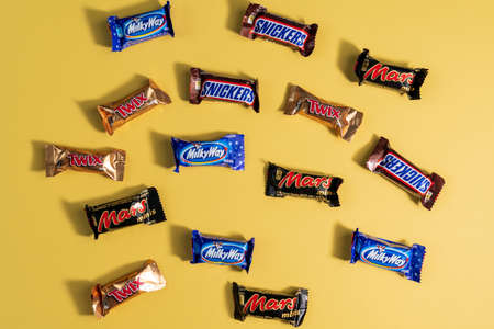 Tyumen, Russia-January 23, 2022: Many chocolate bars produced by Mars Incorporated. Flat layのeditorial素材