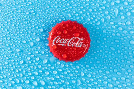 Tyumen, Russia-January 19, 2022: Coca Cola cap close up with water drops. Selective focusのeditorial素材