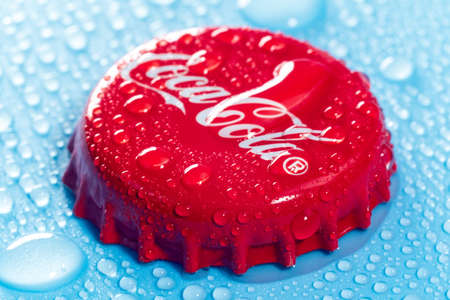 Tyumen, Russia-January 19, 2022: Coca Cola cap close up with water drops. Selective focusのeditorial素材