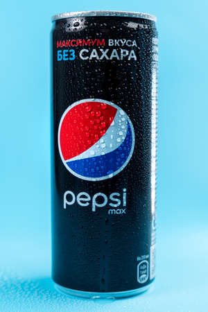 Tyumen, Russia-January 19, 2022: Pepsi is a carbonated soft drink produced by PepsiCo. Vertical...
