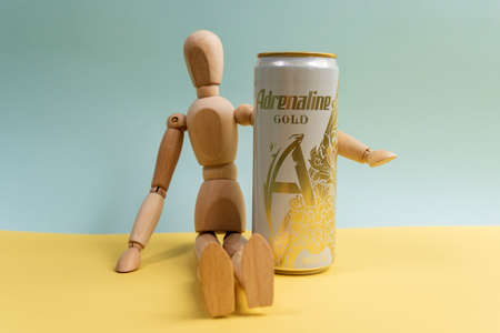 Tyumen, Russia-December 27, 2021: Adrenaline Rush Energy drink, metal can gold. Selective focusのeditorial素材