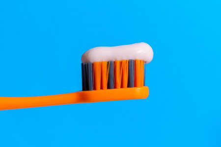 Toothbrush on a hygienic concept, close-up. The concept of brushing teeth.の写真素材