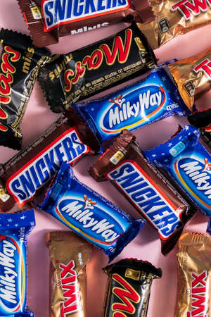 Tyumen, Russia-January 23, 2022: Snickers, Mars, Twix, milky way, bounty minis candy. Chocolate bars...