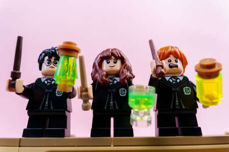 Tyumen, Russia-January 12, 2022: Harry Potter, Ron Weasley and Hermione Granger, minifigures. selective focusのeditorial素材