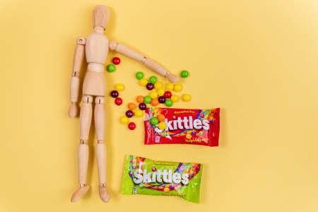 Tyumen, Russia-December 27, 2021: Skittles sweets brand is owned and produced by the Wrigley Company. multicolored backgroundのeditorial素材