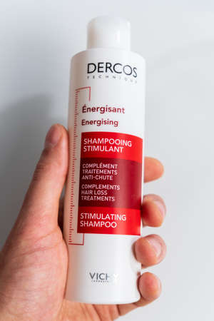 Tyumen, Russia-December 20, 2021: Closeup of Vichy logo shampoo selective focus. vertical photoのeditorial素材