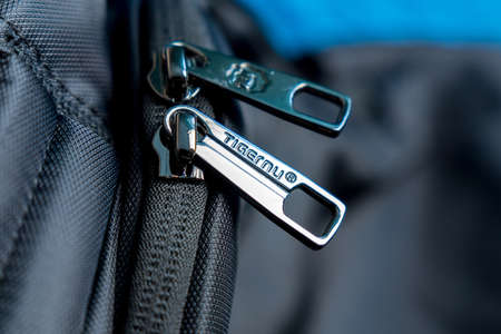 Tyumen, Russia-February 03, 2022: Tiger logo is a manufacturer of backpacks and bags. Tigernu Leather Co. Ltdのeditorial素材