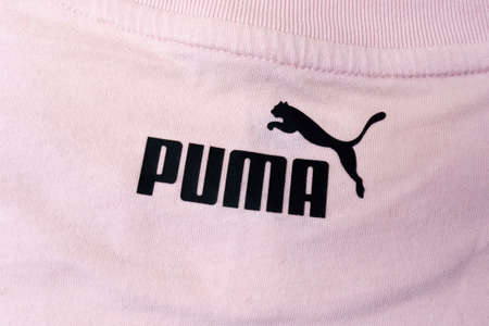 Tyumen, Russia-December 08, 2021: Trademark logo of sportswear manufacturer PUMA close up.のeditorial素材