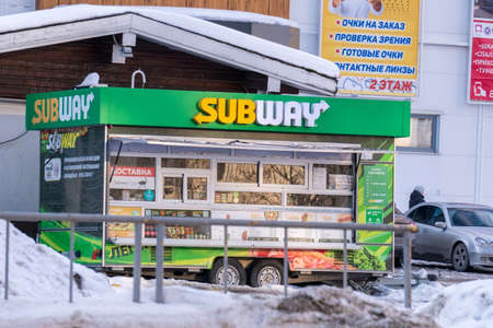 Tyumen, Russia-February 21, 2022: Subway logo on a facade. Subway is an American fast food. fast food restaurant chainのeditorial素材