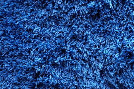 Fuzzy blue for plain. Shaggy blanket background. close up. selective focusの写真素材