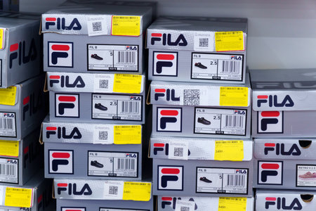 Tyumen, Russia-September 13, 2022: Fila logo model disruptor 2 white sneakers is one of the world's largest sportswear manufacturing companies.のeditorial素材