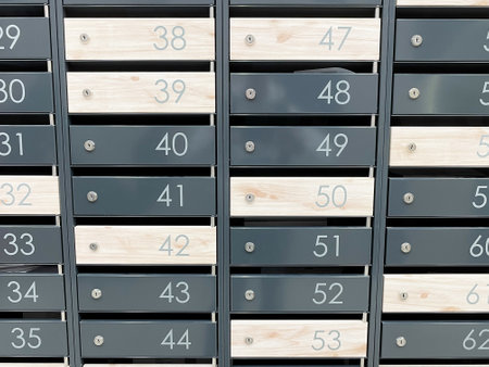 Steel mail boxes in an apartment residential building. Residential or office buildingの写真素材