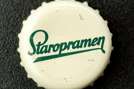 Tyumen, Russia-February 15, 2023: Staropramen is the flagship product of Staropramen Brewery, Czech Republic. Old beer lid, logoのeditorial素材