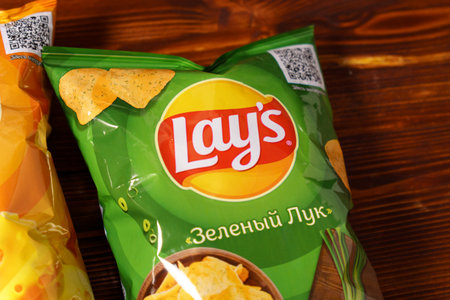 Tyumen, Russia-January 06, 2023: Lays potato chips, popular American brand founded in 1932 and owned by PepsiCo since 1965.のeditorial素材
