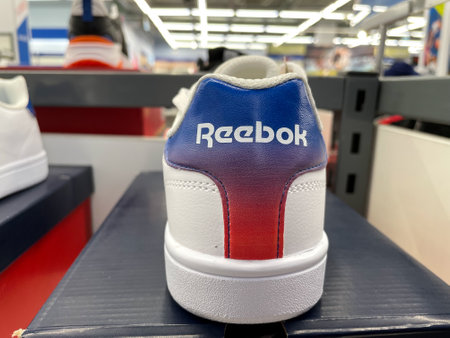 Tyumen, Russia-January 23, 2023: Reebok sneakers on a sports shop window. selective focusのeditorial素材