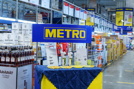 Tyumen, Russia-February 25, 2023: Metro logo of a supermarket. Metro cash and carry is a leading international companyのeditorial素材